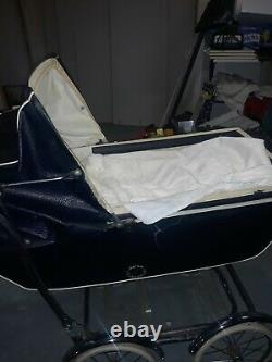 1950s Rex stroller with canopy blue with white trim chrome wheels