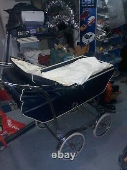 1950s Rex stroller with canopy blue with white trim chrome wheels