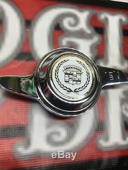 4 Lowrider Wire Wheel knock offs chrome. One Set Of 4 White, gold Cadillac Chips