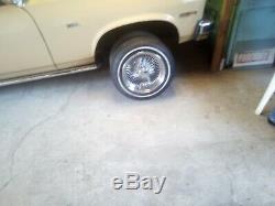 4 rims 14inch daytons new tires 90% tread on them chrome white wall