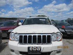 Used Wheel fits 2009 Jeep Grand cherokee 18x8 aluminum chrome clad Grade C