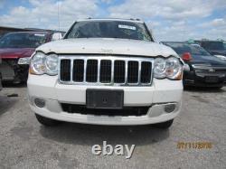 Used Wheel fits 2009 Jeep Grand cherokee 18x8 aluminum chrome clad Grade C