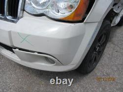 Used Wheel fits 2009 Jeep Grand cherokee 18x8 aluminum chrome clad Grade C