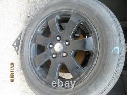 Used Wheel fits 2009 Jeep Grand cherokee 18x8 aluminum chrome clad Grade C