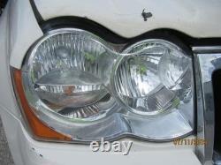 Used Wheel fits 2009 Jeep Grand cherokee 18x8 aluminum chrome clad Grade C