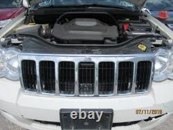 Used Wheel fits 2009 Jeep Grand cherokee 18x8 aluminum chrome clad Grade C