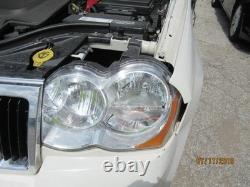 Used Wheel fits 2009 Jeep Grand cherokee 18x8 aluminum chrome clad Grade C