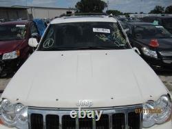 Used Wheel fits 2009 Jeep Grand cherokee 18x8 aluminum chrome clad Grade C