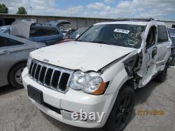 Used Wheel fits 2009 Jeep Grand cherokee 18x8 aluminum chrome clad Grade C